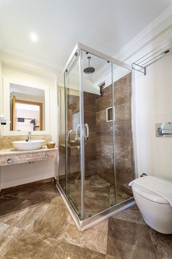 Shower, free toiletries, hair dryer, slippers