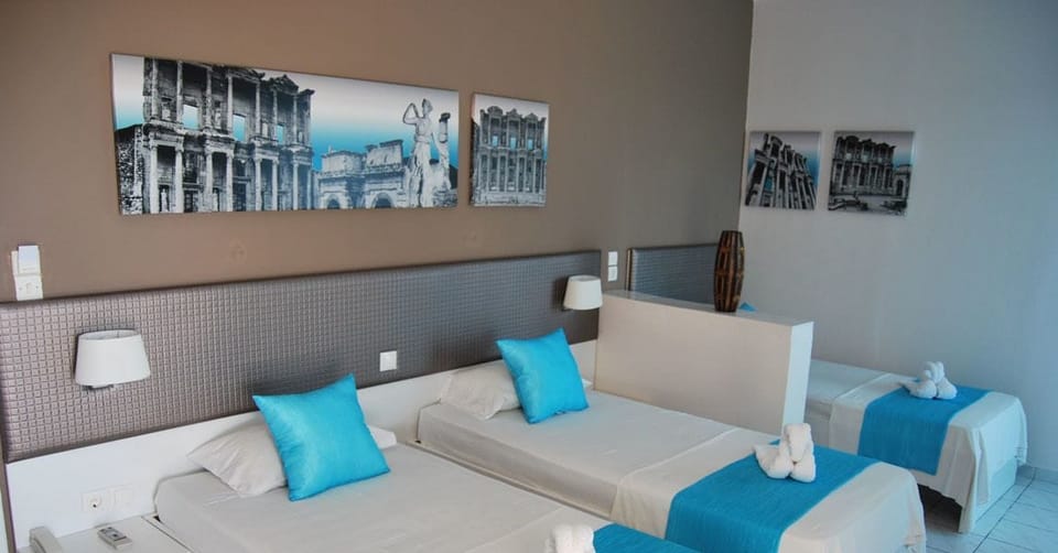 Family Room, Partial Sea View | Free WiFi, bed sheets