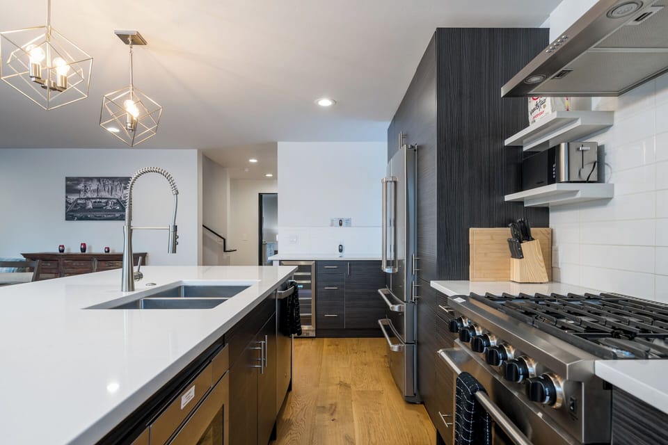 Gourmet Kitchen boasts gas range, luxury Thor Fridge, Wine Fridge, Microwave.