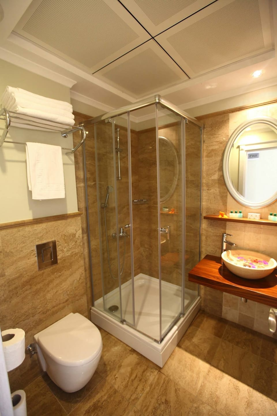 Shower, hair dryer, slippers, towels