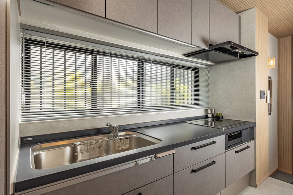Deluxe Villa | Private kitchen | Full-size fridge, microwave, stovetop, espresso maker