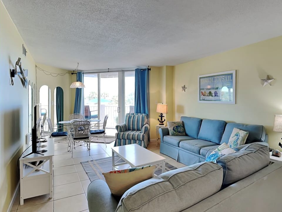 Living Room - Smart TV, Sofa Sleeper + Balcony Access