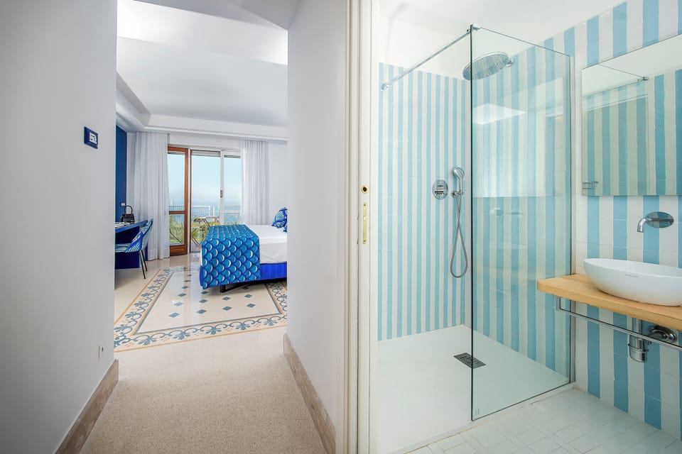 Panoramic Double Room, Balcony, Sea View | Minibar, in-room safe, desk, laptop workspace