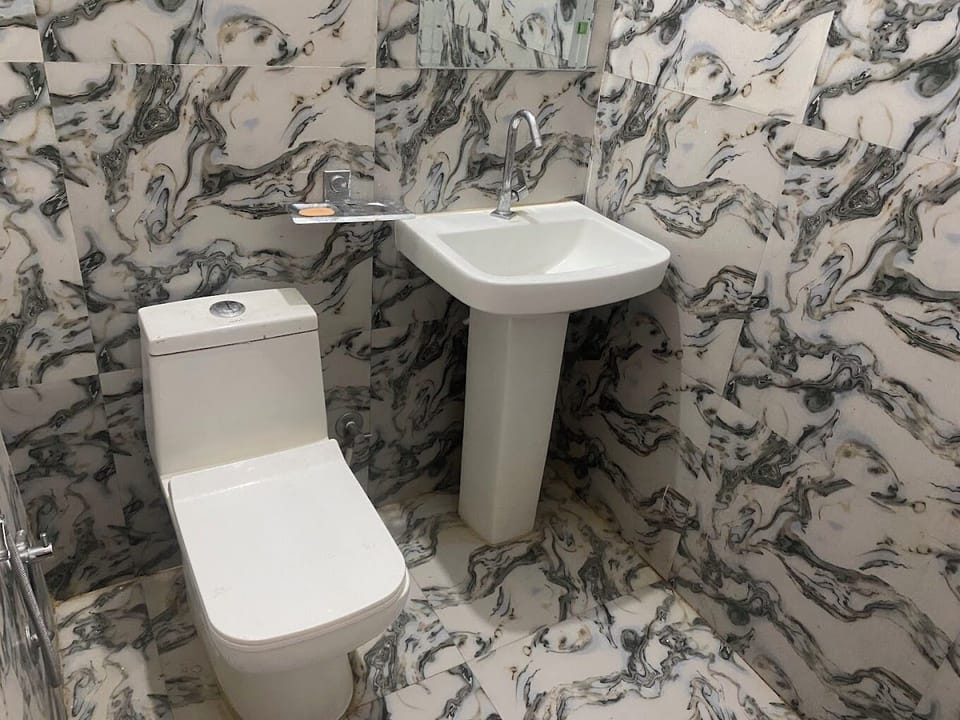 Shower, free toiletries, slippers, bidet