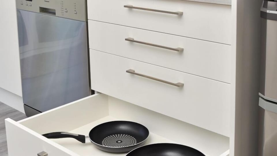 Fully equipped kitchen with quality pots, pans, and all the essentials for easy home cooking.