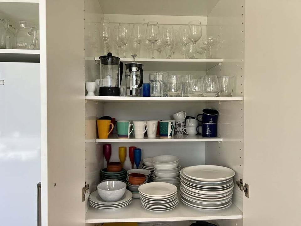 Well-appointed storage with ample crockery for family and friends