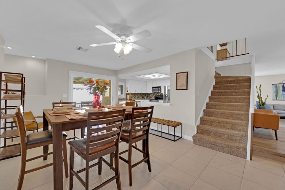 Adjacent to the kitchen, a formal dining and living room offer the perfect setting for elegant meals and gatherings.