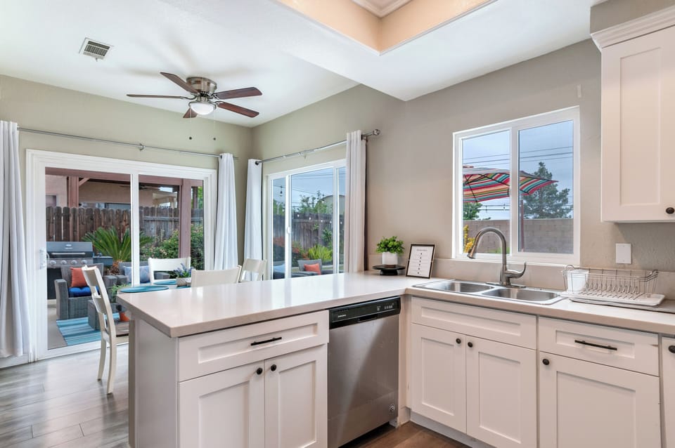 Downstairs: Kitchen with stainless steal appliances and coffee station