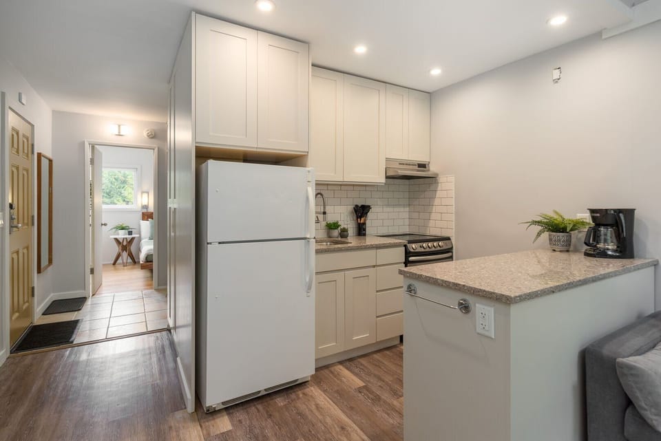 A fully equipped modern kitchen makes meal prep easy and enjoyable.