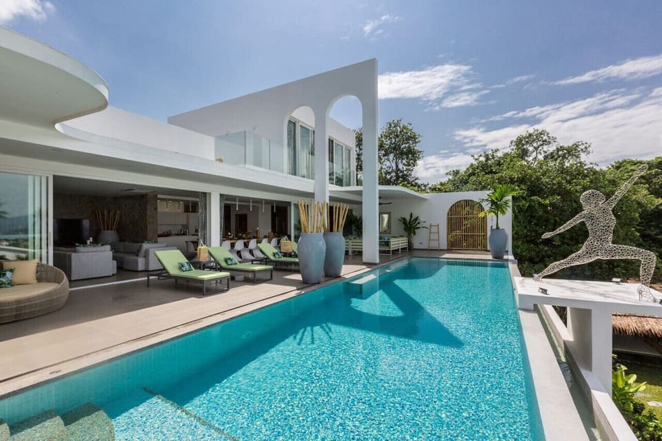 Luxury poolside lounge with sun beds at C Villa, Koh Samui vacation rental in Thailand