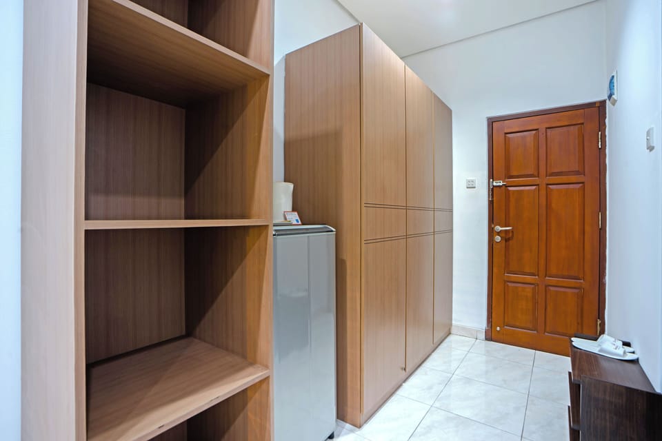 Deluxe Room | Bathroom | Slippers, towels, soap, shampoo