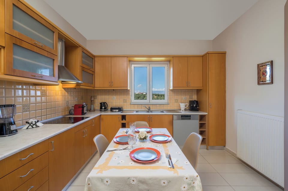 Family Villa, 3 Bedrooms, Sea View, Mountainside | Private kitchen | Electric kettle, toaster, highchair