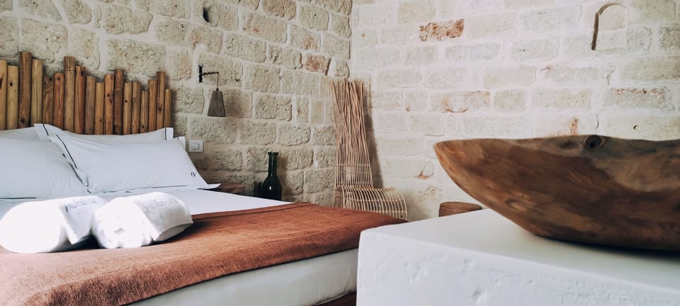 Deluxe Room, Balcony | Minibar, in-room safe, desk, laptop workspace