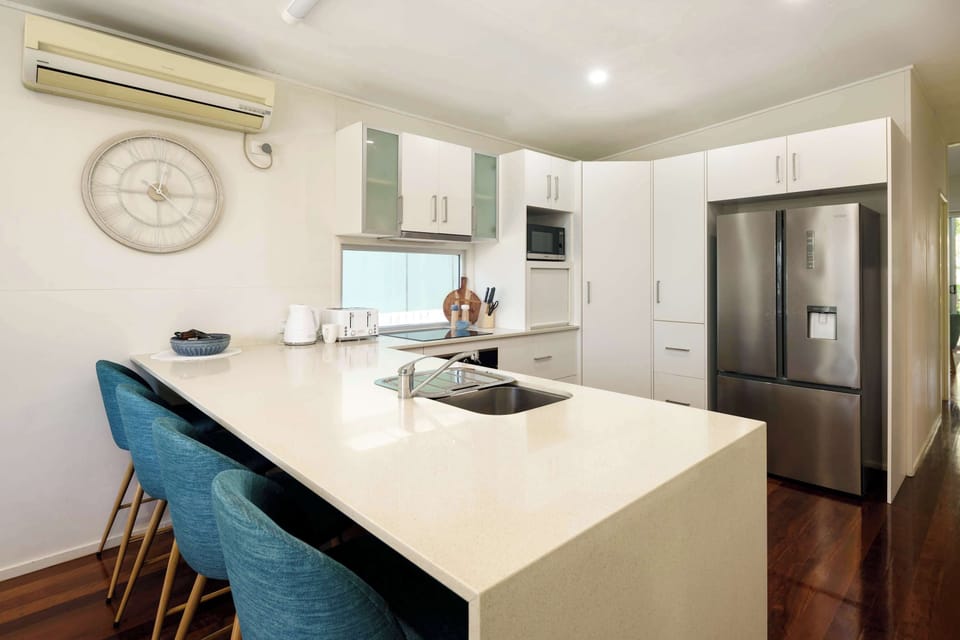 Spacious kitchen offers plenty of bench space