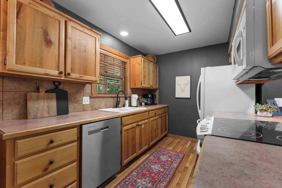 The cabinets are stocked with everything you need to cook up some meals at home (pots, pans, blender, etc.)!