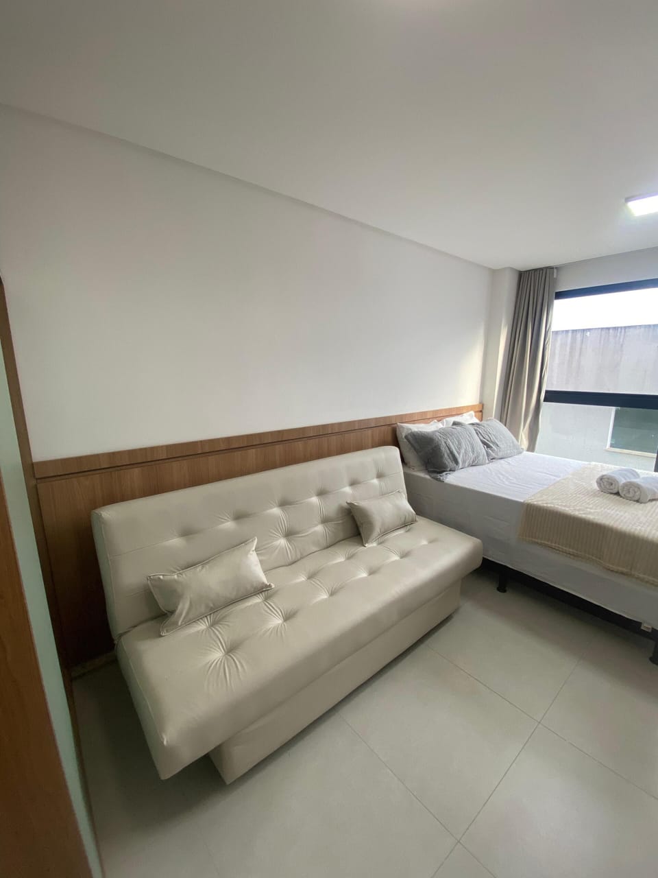 Comfort Studio | Laptop workspace, blackout drapes, iron/ironing board