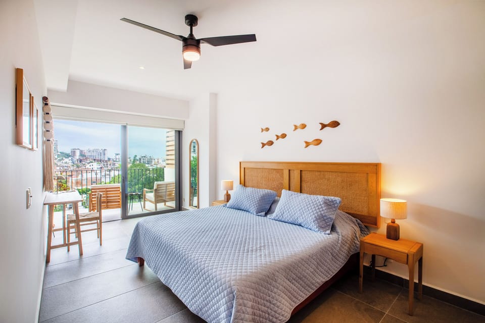 The master bedroom offers a comfortable king size bed