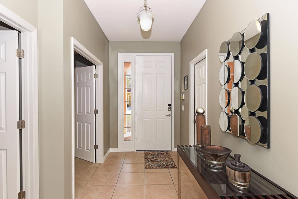 Step into a bright and inviting entryway that sets the tone for a cozy and stylish stay.