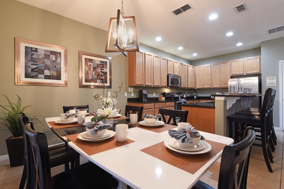 Dine in style in the cozy dining area, perfect for family meals and intimate gatherings.