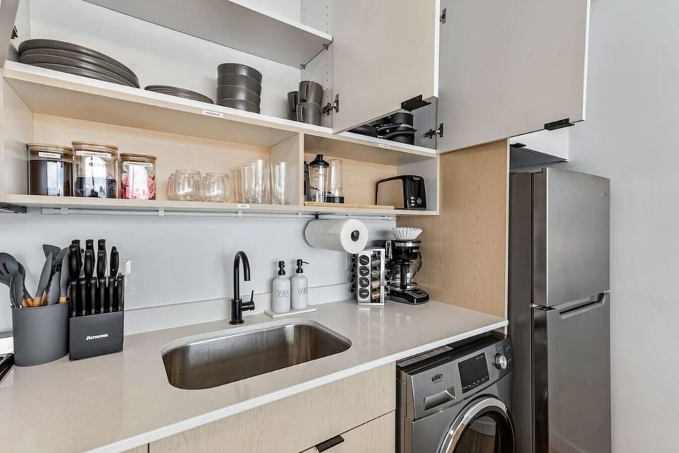 Find everything you need, from dishes and glasses to cookware and utensils, neatly organized for your stay 🍴🥂🍳