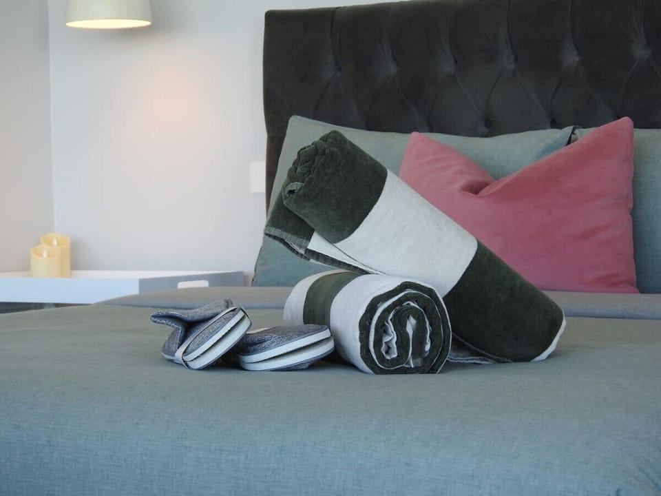 🧺 Fresh towels and essentials neatly prepared for guests