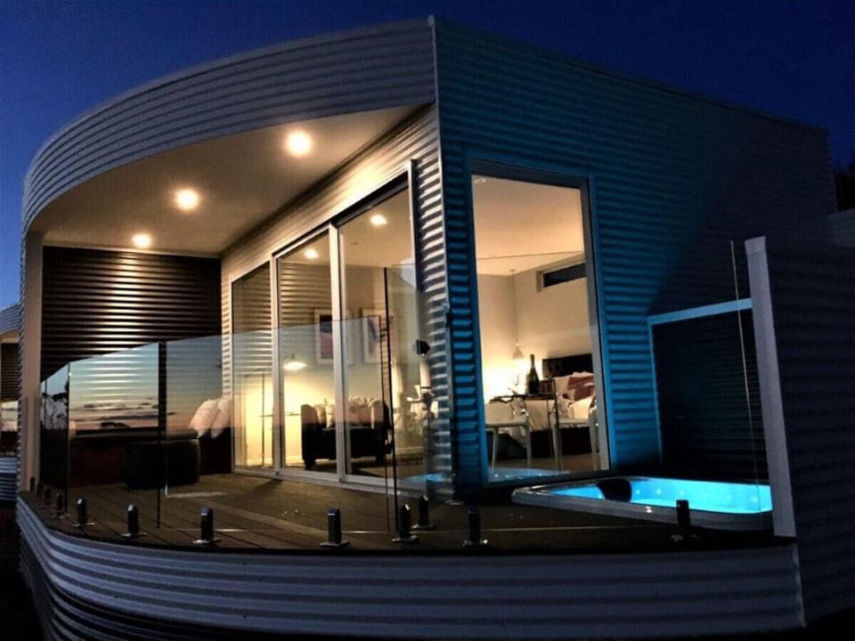 🌙 Private spa retreat with balcony and ambient evening lighting