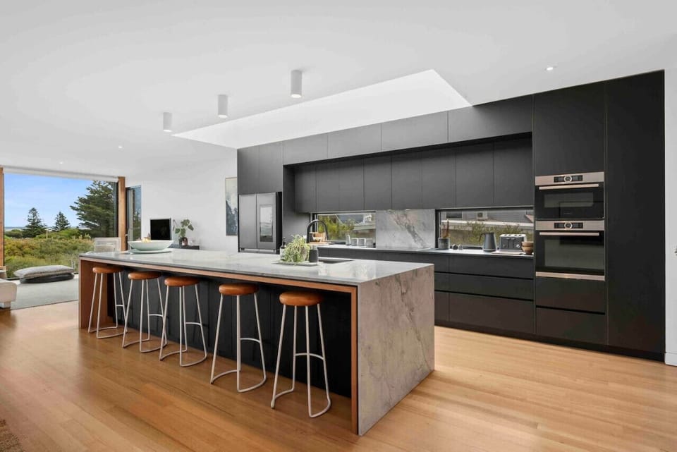 Modern kitchen with large island and high-end finishes