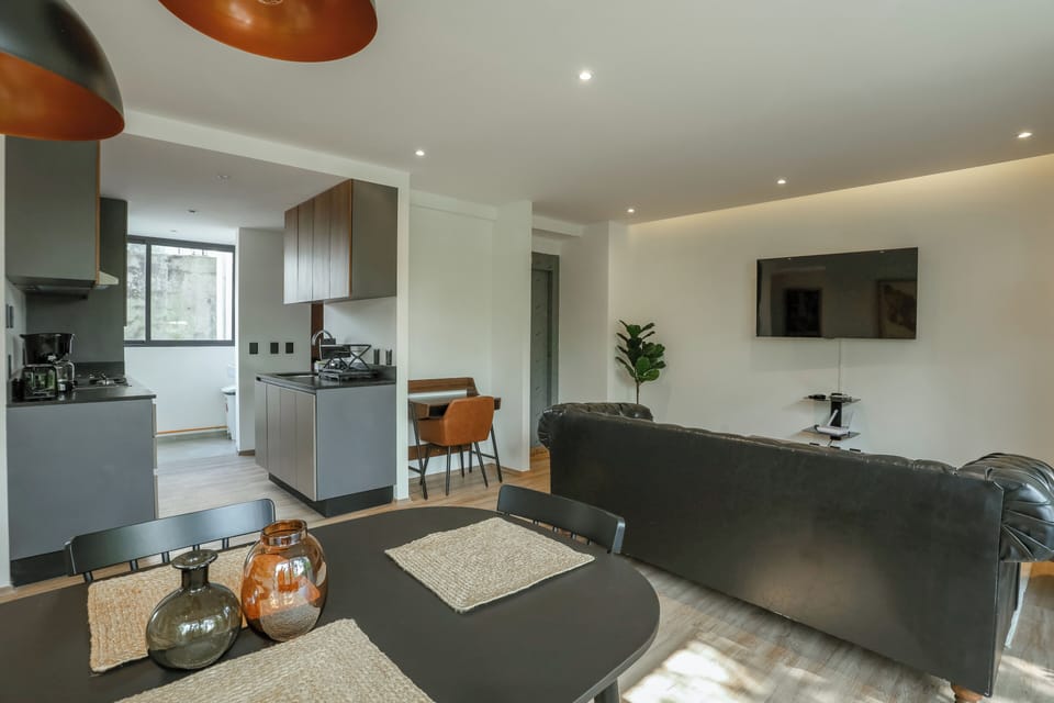 Comfort Apartment, 2 Bedrooms, Balcony | Living area | Flat-screen TV, computer monitors