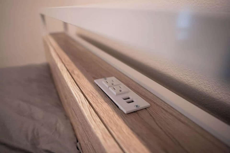 Convenient outlets and USB ports at every bed