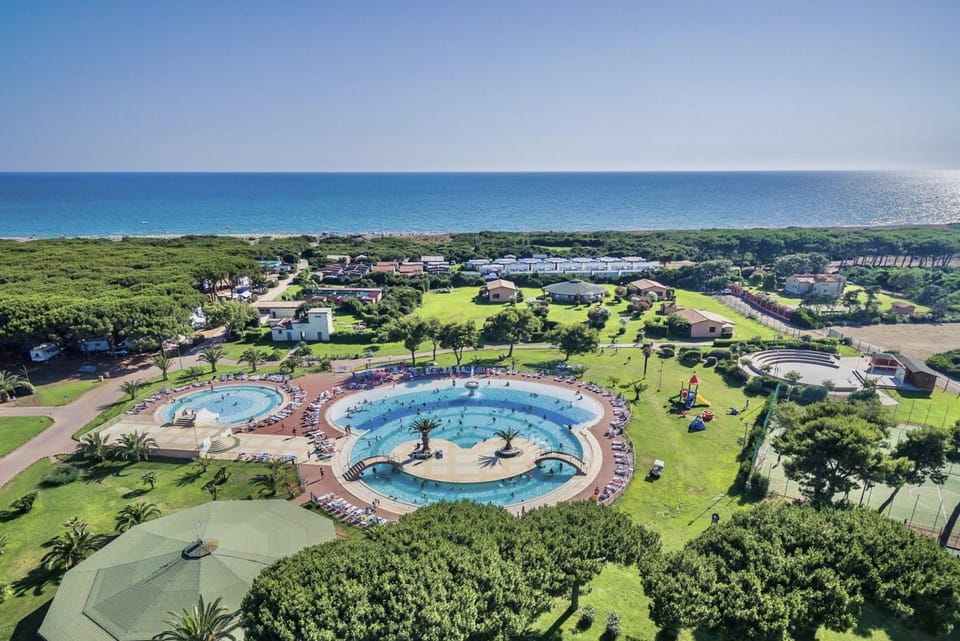 Nice and welcoming mobile home located near the beach with air conditioning of approximately 24 m2 composed of a living room, kitchenette with gas stove, fridge with freezer, pots and pans.A bedroom with a double bed and another bedroom with two single b Campground/ 
RV Resort in Lazio