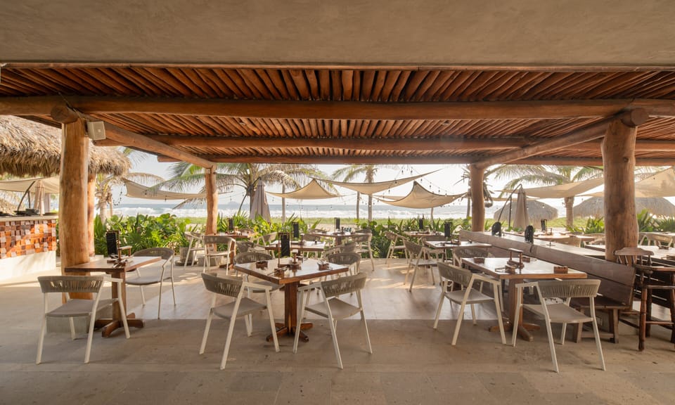Dine and unwind at this beachfront restaurant, offering delicious meals with breathtaking panoramic ocean views.