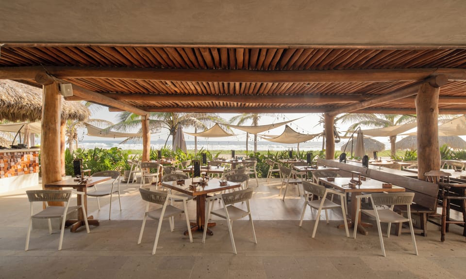 Dine and unwind at this beachfront restaurant, offering delicious meals with breathtaking panoramic ocean views.
