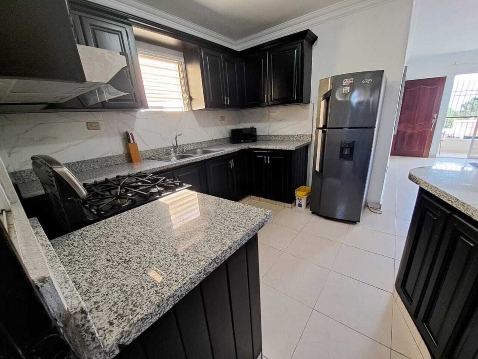 Comfort Apartment, Balcony, City View | Private kitchen | Full-size fridge, oven, stovetop, coffee/tea maker