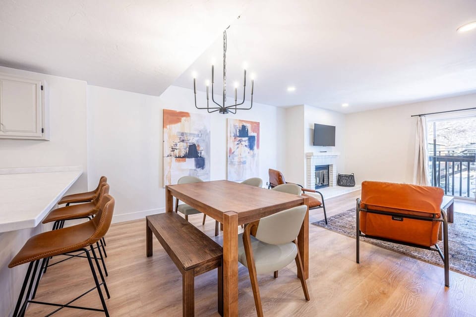 Open-concept living space connecting kitchen and dining area.