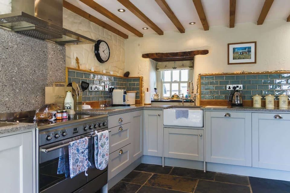 Beautiful kitchen with a range cooker and Belfast sink