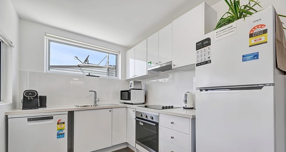 Kitchen - coffee machine, microwave, oven, toaster, kettle, fridge, dishwasher.