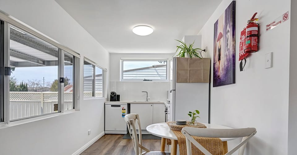 Dining area looking onto kitchen.