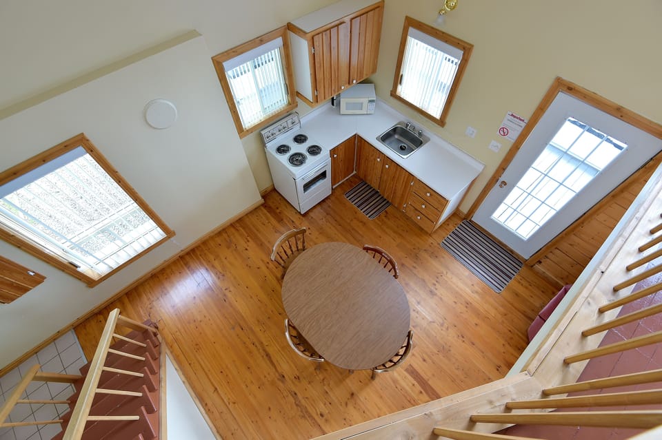 Chalet, 2 Double Beds (Mezzanine) | Living area | TV