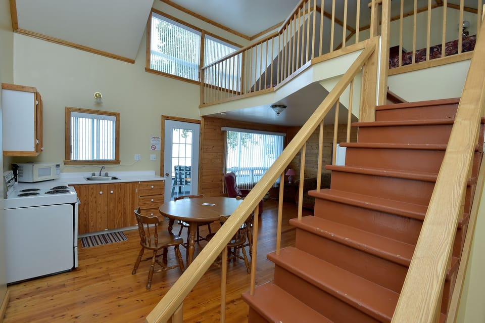 Chalet, 2 Double Beds (Mezzanine) | Living area | TV