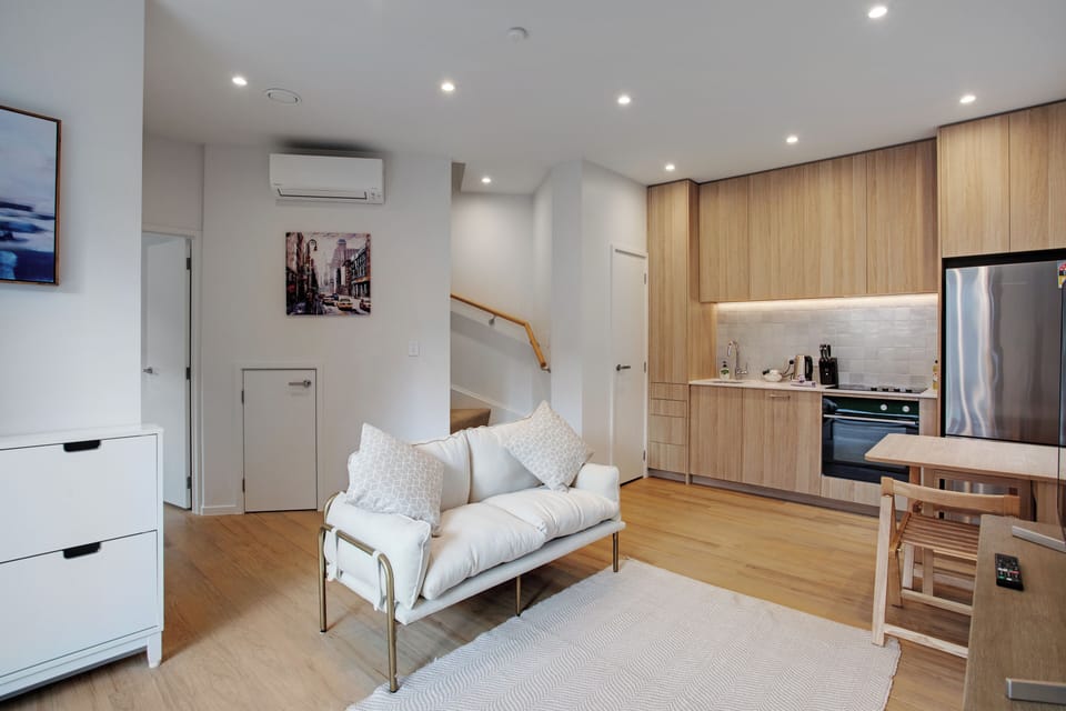 Townhome | Living area | 42-inch TV with digital channels