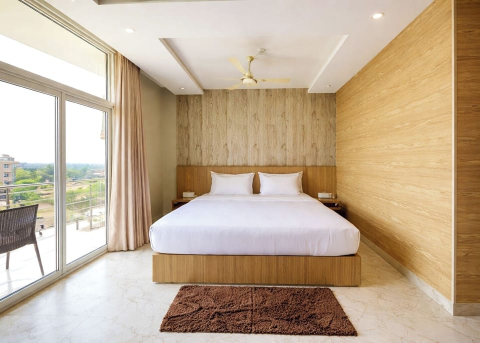Premium bedding, desk, laptop workspace, soundproofing