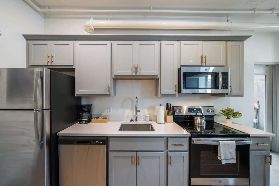 Kitchen: Fully equipped kitchen featuring stainless steel appliances.