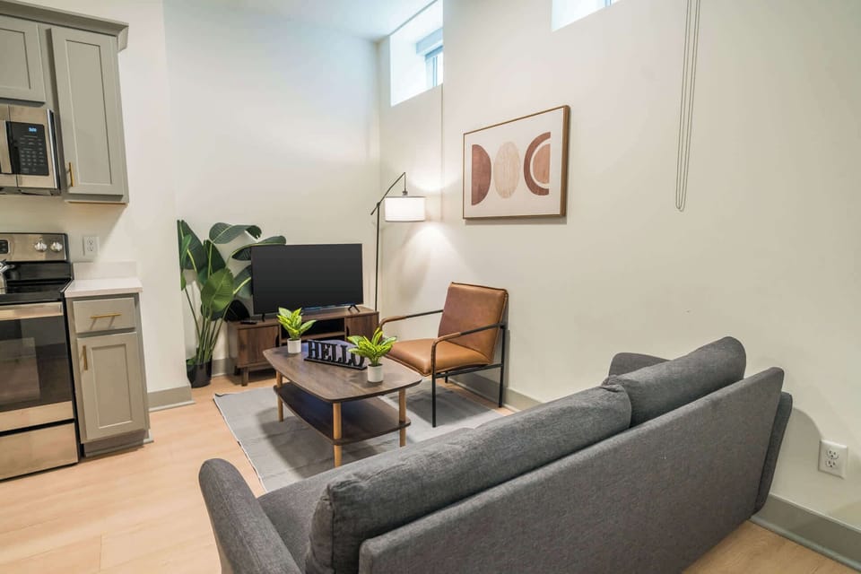 Living Room: Sink into a plush sofa after a day of exploring, with stylish decor and a welcoming ambiance.
