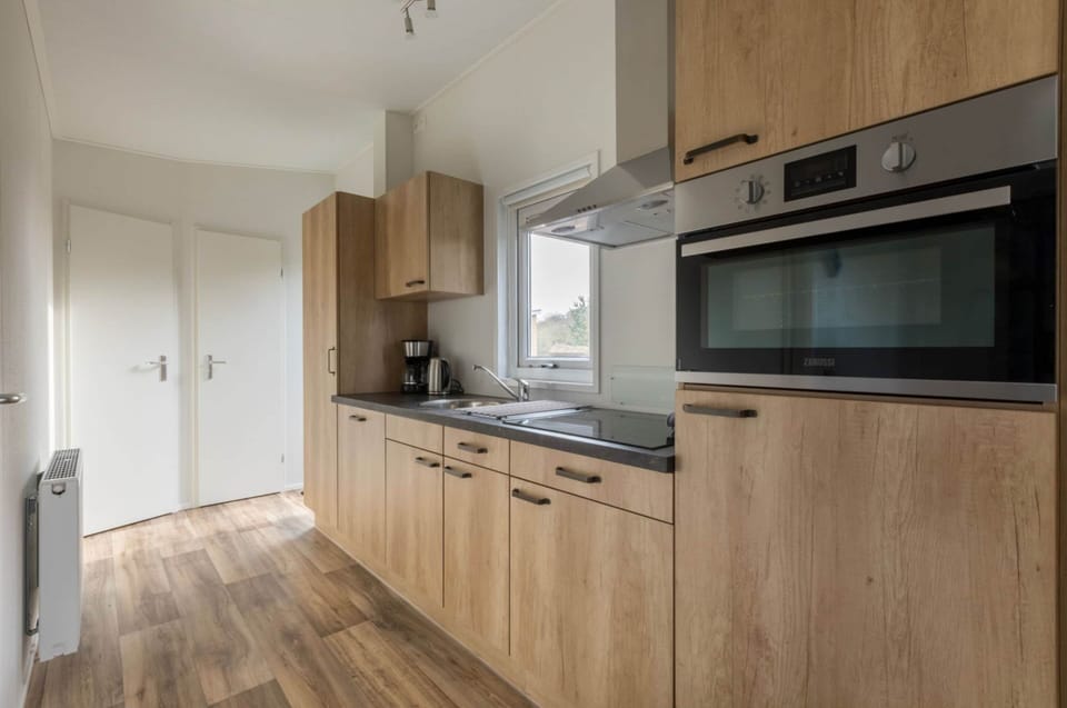 Fridge, microwave, dishwasher, coffee/tea maker