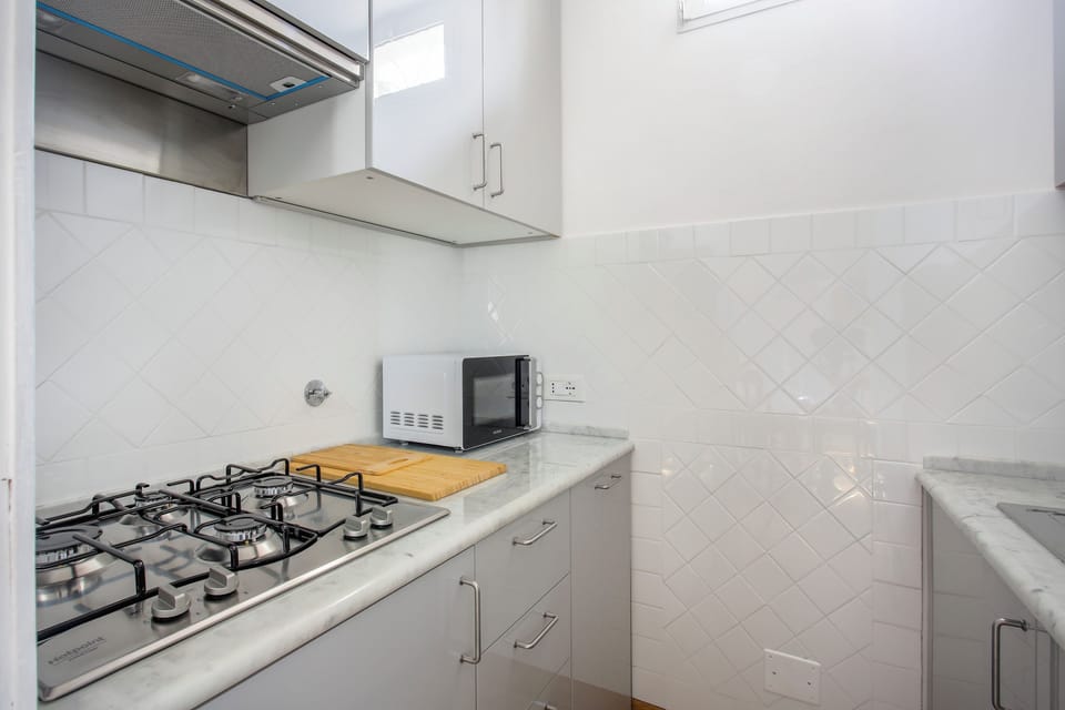 Comfort Apartment, City View | Private kitchen
