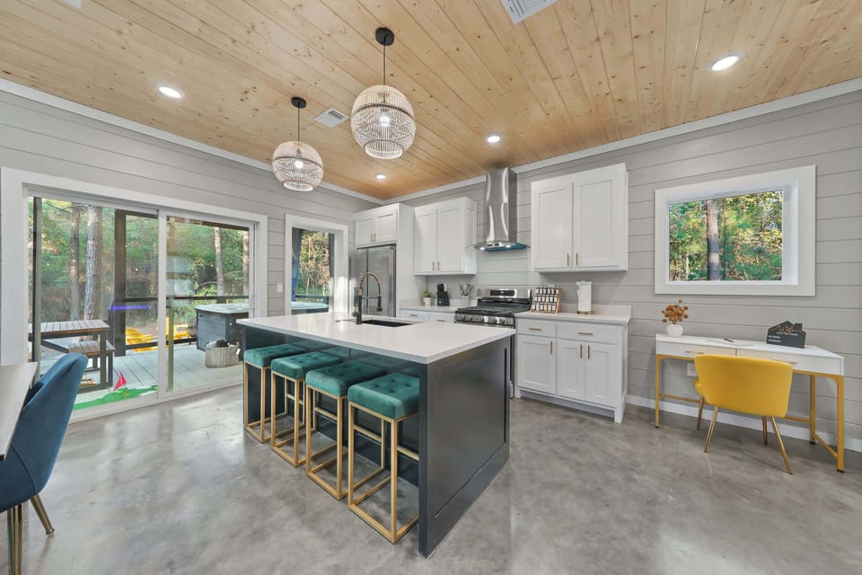 The fully-equipped kitchen includes all the dining and cooking necessities you'll need, including utensils for the BBQ grill on the deck!