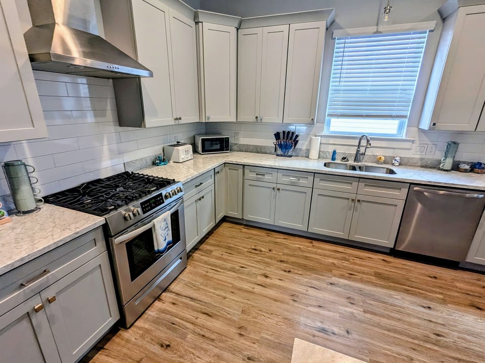 Updated and spacious kitchen stocked with all of your cooking needs 