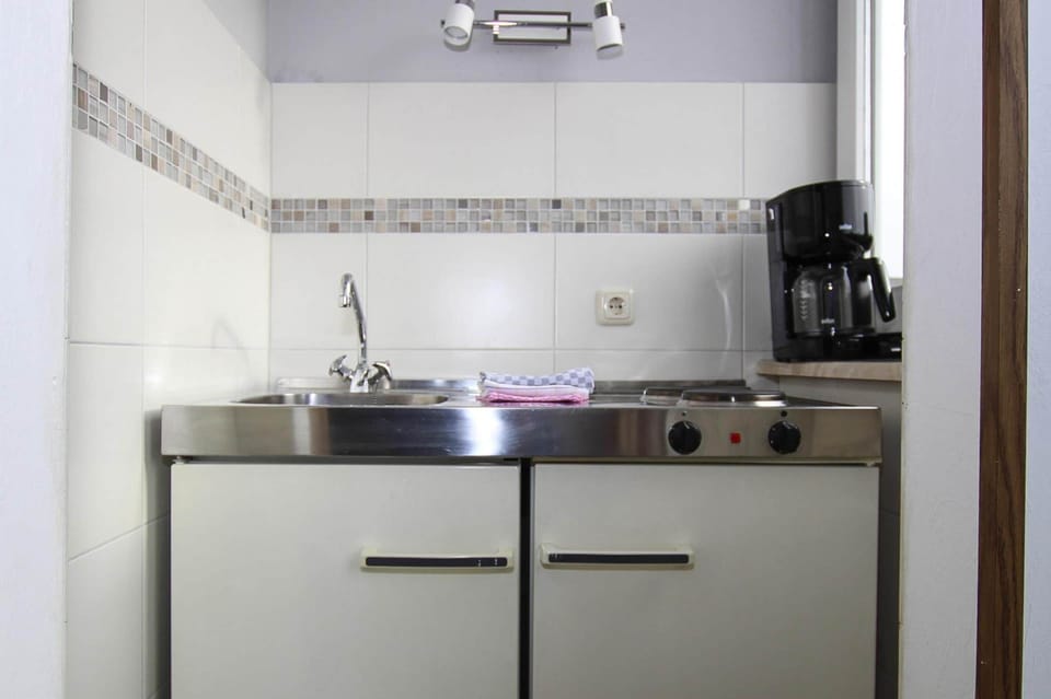 Fridge, microwave, coffee/tea maker, electric kettle