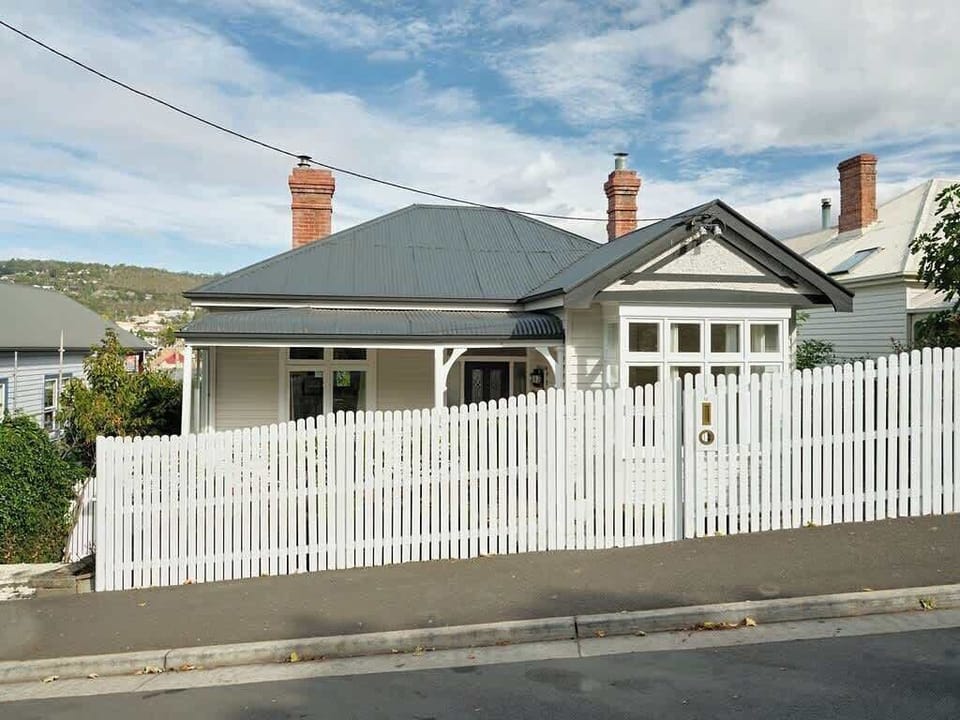 The apartment is on the lower level of the house, accessed privately down the side of the property.