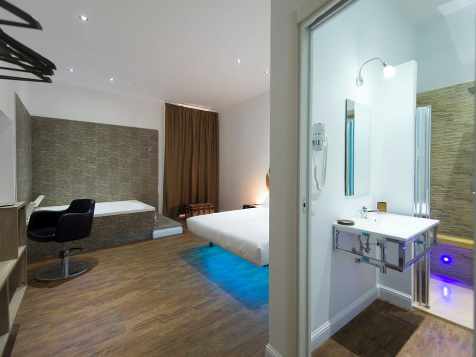 Suite, Jetted Tub | In-room safe, desk, WiFi (free)